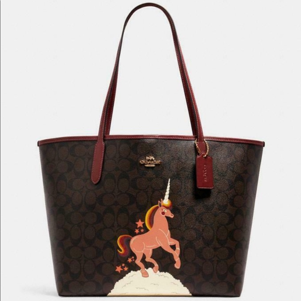 Brand New Signature coated canvas tote.